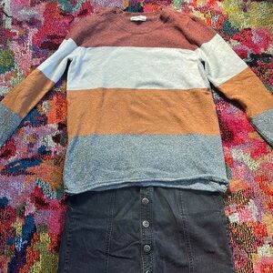 Soft and cozy colorblock sweater.